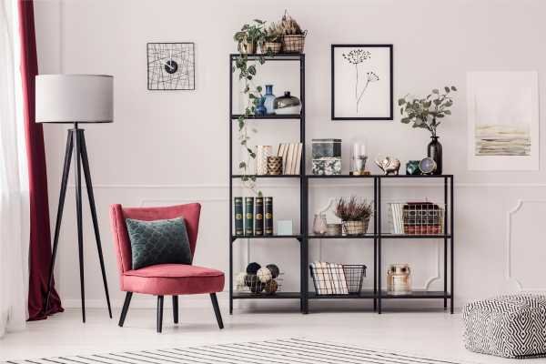 Layering and Grouping Organize Open Shelves in Living Room