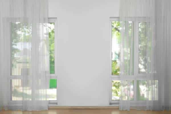 Incorporating Curtains with Other Window Treatments