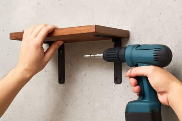 How to Hang Shelves on Concrete Walls