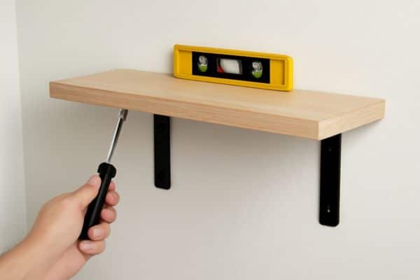 Mount the Brackets and Attach the Shelf To Hang Shelves On Brick Wall