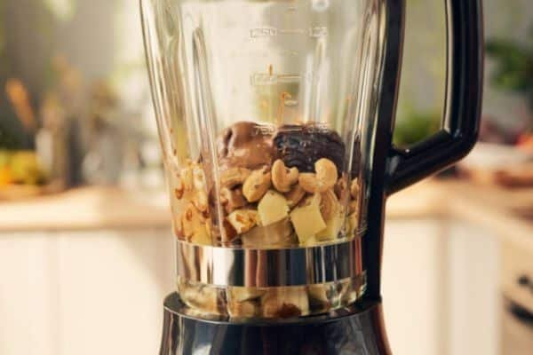 Step 1: Add peanuts to the blender to Make Peanut Butter in a Blender