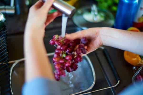 Step 1: Wash and Prep the Grapes to Make Grape Juice With a Blender